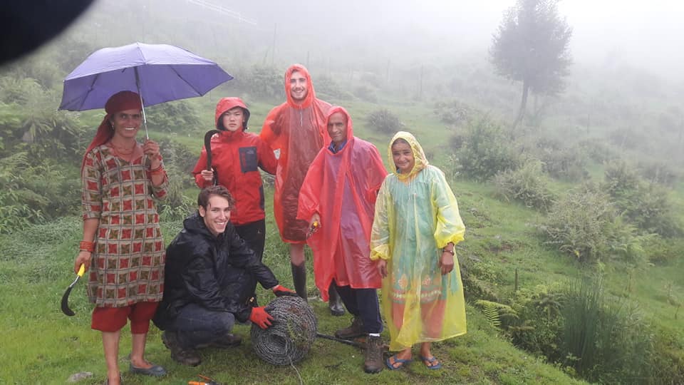 Monsoon fieldwork in rain gear